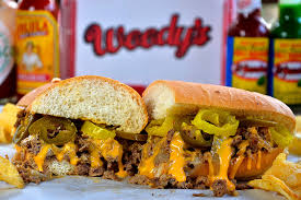 Woody's Cheesesteaks signature dishes Classic Cheesesteak
Italian Sub
Chili Slaw Dog